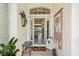 Inviting entryway with open door leading into the home at 10322 Sunbury Dr, Port Charlotte, FL 33981