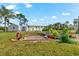 Landscaped backyard oasis with a productive garden at 10322 Sunbury Dr, Port Charlotte, FL 33981