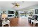 Relaxing Gathering room with fireplace, pool view, and sliding glass doors at 10322 Sunbury Dr, Port Charlotte, FL 33981