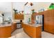 Spacious kitchen with granite countertops, island, and stainless steel appliances at 10322 Sunbury Dr, Port Charlotte, FL 33981