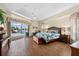 Spacious main bedroom with water views, and access to the pool area at 10322 Sunbury Dr, Port Charlotte, FL 33981