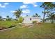 Well-maintained storage shed in a lush backyard setting at 10322 Sunbury Dr, Port Charlotte, FL 33981
