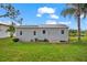Large storage shed or workshop in the backyard at 10322 Sunbury Dr, Port Charlotte, FL 33981