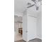 Bright bedroom with double doors leading to a balcony at 10360 Longshore Rd # 66, Placida, FL 33946