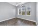 Spacious bedroom with hardwood floors and large windows at 10360 Longshore Rd # 66, Placida, FL 33946