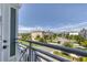 Private balcony overlooks a charming community with lush landscaping at 10360 Longshore Rd # 66, Placida, FL 33946