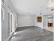 Bright dining room features hardwood floors and access to balcony at 10360 Longshore Rd # 66, Placida, FL 33946