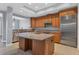 Gourmet kitchen with stainless steel appliances and an island at 10360 Longshore Rd # 66, Placida, FL 33946