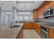 Updated kitchen with granite countertops and stainless steel appliances at 10360 Longshore Rd # 66, Placida, FL 33946