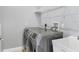 Laundry room with washer, dryer, and shelving at 10360 Longshore Rd # 66, Placida, FL 33946