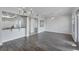 Spacious living room with hardwood floors and an open floorplan at 10360 Longshore Rd # 66, Placida, FL 33946