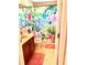 Bathroom with a flamingo shower curtain and a single vanity at 1042 Boundary Blvd, Rotonda West, FL 33947