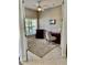 Cozy home office with built-in shelving and a fireplace at 1042 Boundary Blvd, Rotonda West, FL 33947