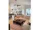 Open living space with sectional sofa and access to kitchen at 1042 Boundary Blvd, Rotonda West, FL 33947
