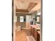 Large ensuite bathroom with a soaking tub and double vanity at 1042 Boundary Blvd, Rotonda West, FL 33947