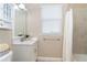 Simple bathroom with vanity, toilet, and shower at 10479 Coquina Ct, Placida, FL 33946