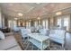 Spacious community room with comfortable seating and high ceilings at 10479 Coquina Ct, Placida, FL 33946