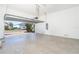 Spacious garage with open view and epoxy floor at 10479 Coquina Ct, Placida, FL 33946