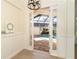 View of the pool from the interior of the home at 10479 Coquina Ct, Placida, FL 33946