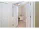Bright home office with built-in desk and double doors at 10479 Coquina Ct, Placida, FL 33946