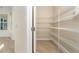 Walk-in pantry with wire shelving for ample storage at 10479 Coquina Ct, Placida, FL 33946