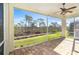 Spacious screened porch with a view of the backyard at 10479 Coquina Ct, Placida, FL 33946