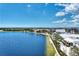 Aerial view of Wellen Park, featuring a lake, park, and various buildings at 10705 Tarflower Dr, Venice, FL 34293