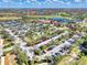 Community with large parking lot and clubhouse at 10705 Tarflower Dr, Venice, FL 34293