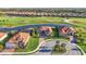 Aerial view of several homes with lush landscaping at 10705 Tarflower Dr, Venice, FL 34293