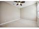 Bedroom with neutral carpet and ceiling fan at 10705 Tarflower Dr, Venice, FL 34293
