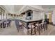 Modern bar with seating and a large countertop at 10705 Tarflower Dr, Venice, FL 34293