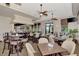 Spacious clubhouse dining area with tables, chairs, and a bar at 10705 Tarflower Dr, Venice, FL 34293