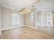 Dining room features tile floors and is adjacent to the home's entryway at 10705 Tarflower Dr, Venice, FL 34293