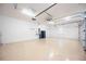View of the large garage with epoxy floor at 10705 Tarflower Dr, Venice, FL 34293