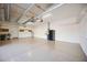 Spacious garage featuring cabinets and a utility sink at 10705 Tarflower Dr, Venice, FL 34293