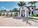 Golf club entrance with covered walkway and signage at 10705 Tarflower Dr, Venice, FL 34293