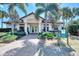Golf shop entrance with landscaping and signage at 10705 Tarflower Dr, Venice, FL 34293