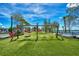 playground with swings and turf at 10705 Tarflower Dr, Venice, FL 34293