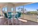 Peaceful screened balcony with outdoor seating and scenic view at 11200 Hacienda Del Mar Blvd # 201, Placida, FL 33946