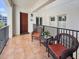 Outdoor balcony with wicker chairs and a view at 11200 Hacienda Del Mar Blvd # 201, Placida, FL 33946
