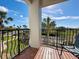 Spacious balcony overlooking the community and partial ocean view at 11200 Hacienda Del Mar Blvd # 201, Placida, FL 33946