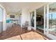 Outdoor balcony with seating area, adjacent to the living room at 11200 Hacienda Del Mar Blvd # 201, Placida, FL 33946