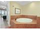 Soaking tub and tile surround at 11200 Hacienda Del Mar Blvd # 201, Placida, FL 33946