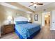 King-size bed, hardwood floors, and ensuite bathroom at 11200 Hacienda Del Mar Blvd # 201, Placida, FL 33946