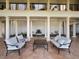 Relaxing courtyard with seating area and a fountain at 11200 Hacienda Del Mar Blvd # 201, Placida, FL 33946