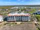 Stunning three-story building with Spanish-style architecture at 11200 Hacienda Del Mar Blvd # 201, Placida, FL 33946