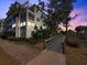 Brick pathway leads to building entrance near waterfront at 11200 Hacienda Del Mar Blvd # 201, Placida, FL 33946