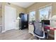 Home office with hardwood floors, large windows, and safe at 11200 Hacienda Del Mar Blvd # 201, Placida, FL 33946