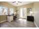 Home office with hardwood floors and built-in desk at 11200 Hacienda Del Mar Blvd # 201, Placida, FL 33946