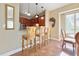 Kitchen with breakfast bar and view into the living room at 11200 Hacienda Del Mar Blvd # 201, Placida, FL 33946